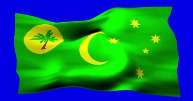 Flag of Cocos Keeling Islands realistic waving on blue screen. Seamless loop animation with high quality video