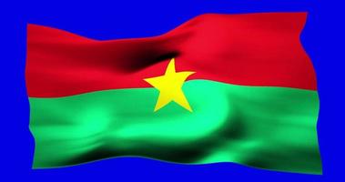 drapeau du burkina faso agitant de manière réaliste sur écran bleu. animation en boucle parfaite de haute qualité video