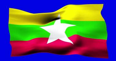 Flag of Myanmar realistic waving on blue screen. Seamless loop animation with high quality video