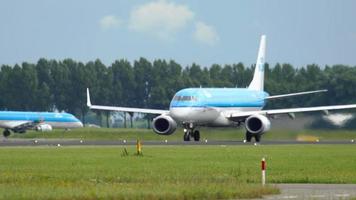 AMSTERDAM, THE NETHERLANDS JULY 24, 2017 - KLM Cityhopper Embraer 190 PH EZT departure at runway 36L Polderbaan. Shiphol Airport, Amsterdam, Holland video