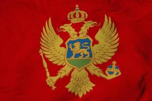 Waving Flag of Montenegro in 3D rendering photo