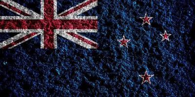 Flag of New Zealand on a textured background. Concept collage. photo