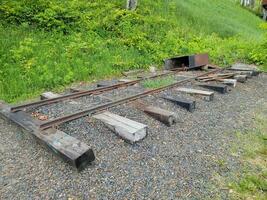 section of old obsolete train track rails photo