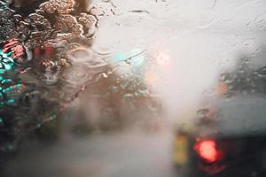 Drizzle on the windshield in the evening. photo