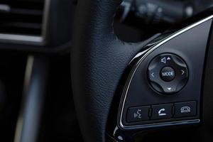 empty cockpit of vehicle control buttons on interior modern car  with photo