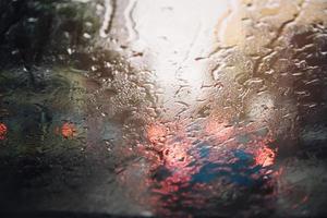 Drizzle on the windshield in the evening. photo
