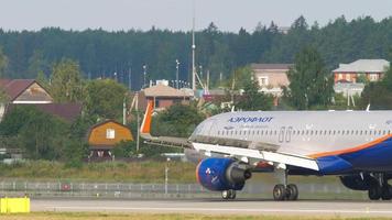 MOSCOW, RUSSIAN FEDERATION JULY 30, 2021 - Airbus A320 of Aeroflot, VQ BSL taxis to the terminal after landing at Sheremetyevo airport SVO. Airplane braking, rear view video