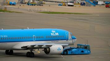 AMSTERDAM, THE NETHERLANDS JULY 29, 2017 - KLM Boeing 737 PH BGU towing before departure. Shiphol Airport, Amsterdam, Holland video