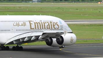 DUSSELDORF, GERMANY JULY 23, 2017 - Emirates Airbus A380 A6 EOB taxiing before departure. Dusseldorf Airport, Germany video
