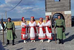 Tetyushi.Tatarstan. May 02, 2022.Performance of the folklore ensemble on the square at watch tower. photo