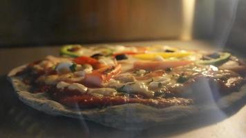 Preparing sea food pizza in oven video