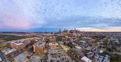 Panoramic picture of the Dallas skyline in morning sun and cloudy sky photo