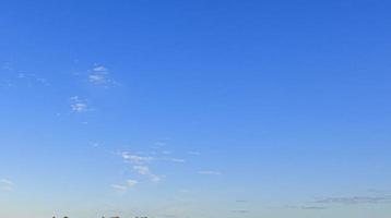 Image of a partly cloudy and partly clear sky during the day photo