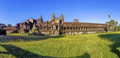 Mystical and famous ruins of Anchor Wat in Cambodia with no people in summer photo