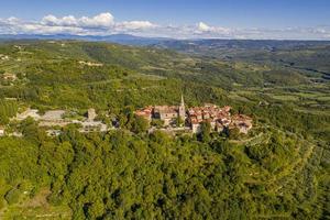 Aerial panoramic drone picture of the medieval town of Groznjan on the Istrian peninsula during daytime photo