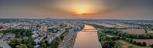 Drone panorama over Main river and Offenbach with Frankfurt skyline photo