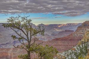 Panoramic view from south cliff of Grand Canyon with dramatic cloud formations in winter photo