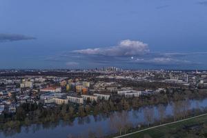 Aerial panoramic picture of river Main and the Frankfurt skyline during sunset in winter photo