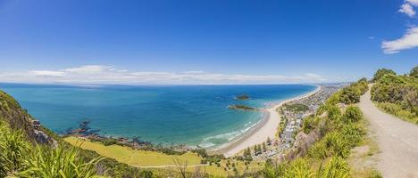 Panoramic picture of Touranga city and Papamoa Beach from Mount Maunganui on northern island of New Zealand in summer photo