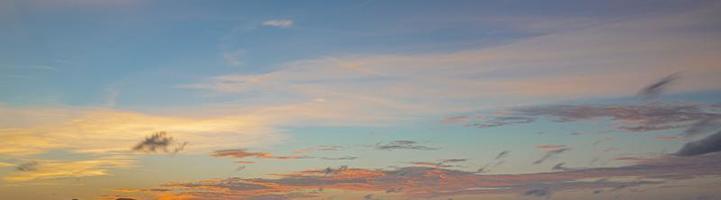 Dramatic colorful sky with afterglow and illuminated clouds photo