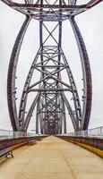 Close up picture of the impressive steel frame structure of the Big Four bridge in Louisville during daytime photo