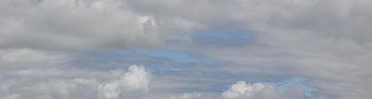 Image of a partly cloudy and partly clear sky during the day photo