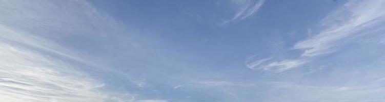 Image of a partly cloudy and partly clear sky during the day photo