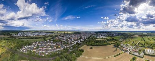 Aerial panoramic picture of the city Moerfelden in southern Hesse area during sunset photo