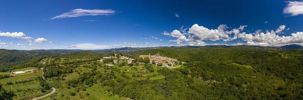 Panoramic aerial drone picture of Hum in Croatia, the smallest city in the world, during daytime photo