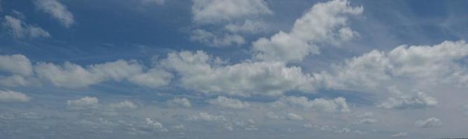 Image of a partly cloudy and partly clear sky during the day photo