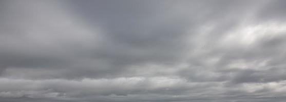 Image of a dark and cloudy sky during the day photo