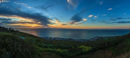 panorama de milton beach en kapstdt al atardecer foto