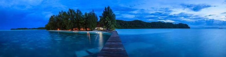 Pier of Carp Island in Palau at evening time in twlilight photo