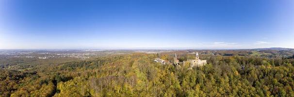 Drone photo of Frankenstein Castle near Darmstadt in Germany with a view over the Rhine-Main area in autumn