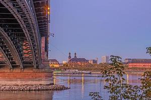 Picture over the Rhine on the Mainz Rhine bank along the Theodor-Heuss bridge at sunrise photo