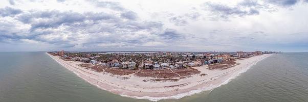 Drone panorama over Clearwater beach in Florida at daytime with cloudy skies photo