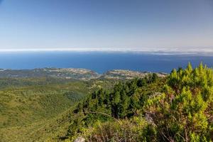 Panoramic picture over the rough Portugese island of Madeira in summer photo