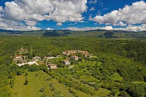 Panoramic aerial drone picture of Hum in Croatia, the smallest city in the world, during daytime photo