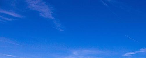 Image of a partly cloudy and partly clear sky during the day photo