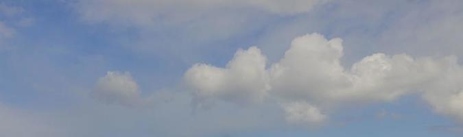 Image of a partly cloudy and partly clear sky during the day photo