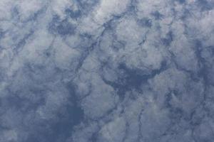 Image of a partly cloudy and partly clear sky during the day photo