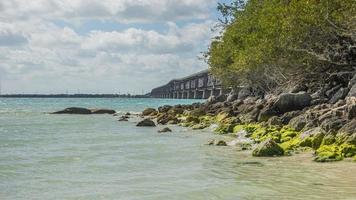 Picture of highway bridge from Sandspur Beach on Florida Keys in spring during daytime photo