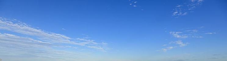 Image of a partly cloudy and partly clear sky during the day photo