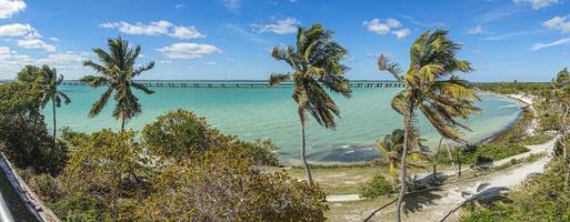 Panoramic picture of highway bridge and Calusa Beach on Florida keys in spring during daytime photo