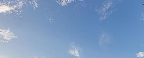 Image of a partly cloudy and partly clear sky during the day photo