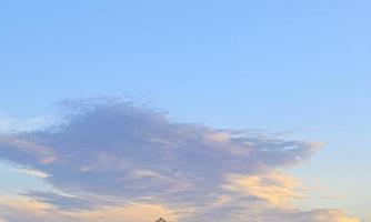 Dramatic colorful sky with afterglow and illuminated clouds photo