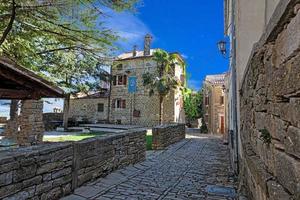 Typical street scene of the medieval town of Groznjan on the Istrian peninsula without people photo