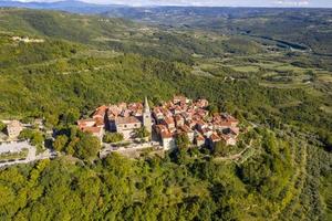 Aerial panoramic drone picture of the medieval town of Groznjan on the Istrian peninsula during daytime photo