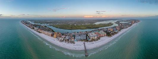 Drone panorama over Redington Beach in St. Petersburg in Florida with pier at sunset photo