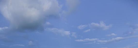 Image of a partly cloudy and partly clear sky during the day photo